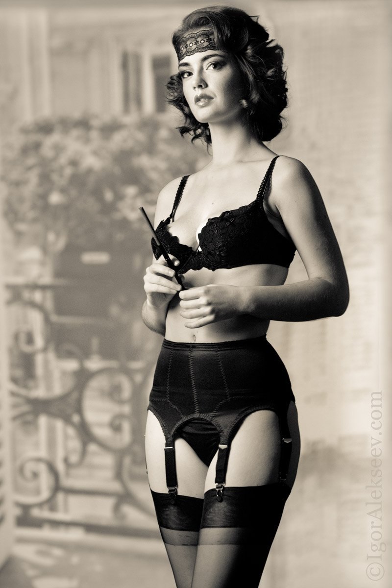 Margaret Nolan in stockings and belt