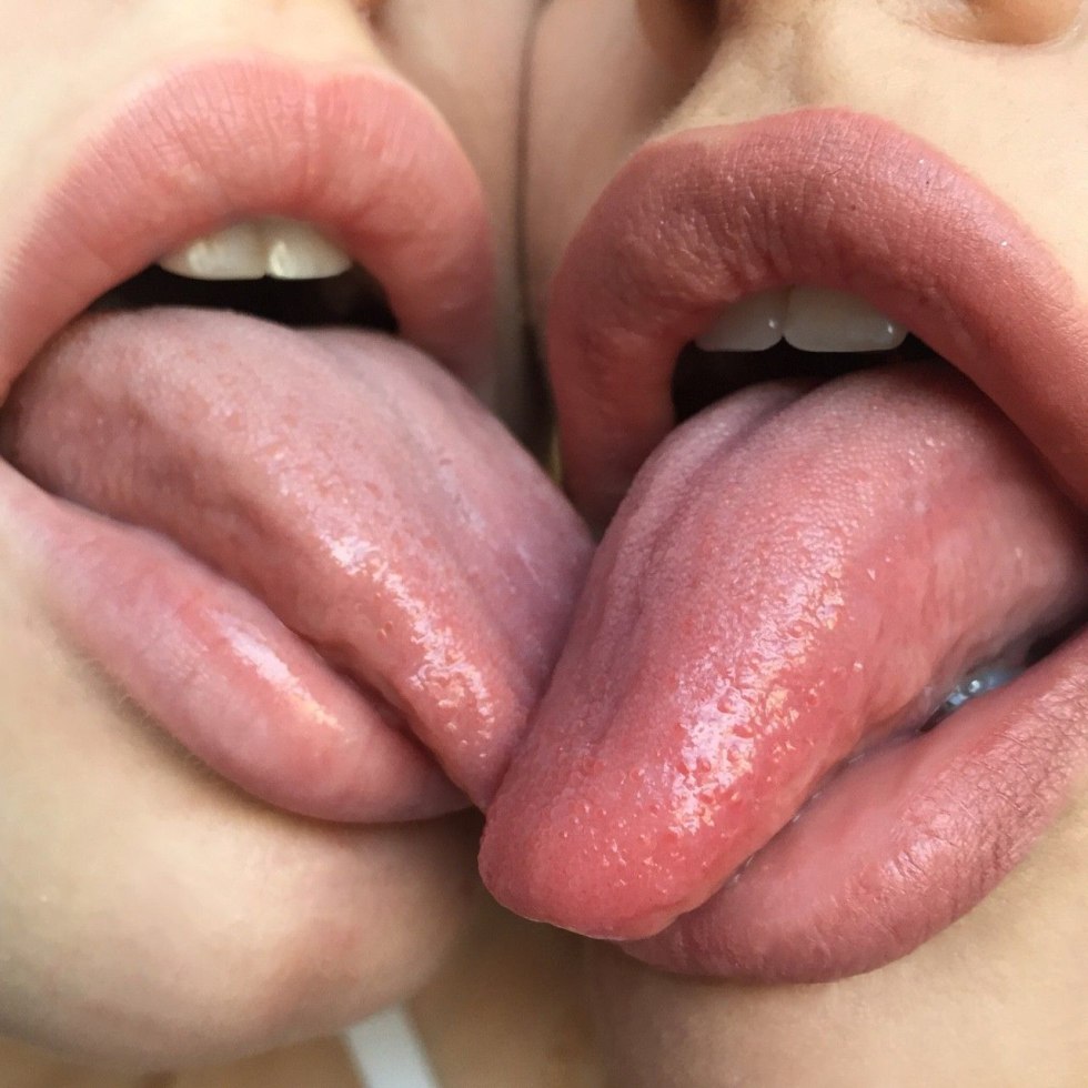 Women lick a long tongue