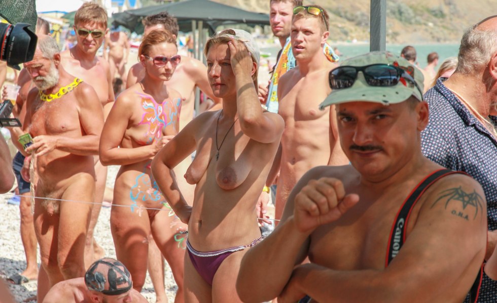 Naked girls on a regular beach