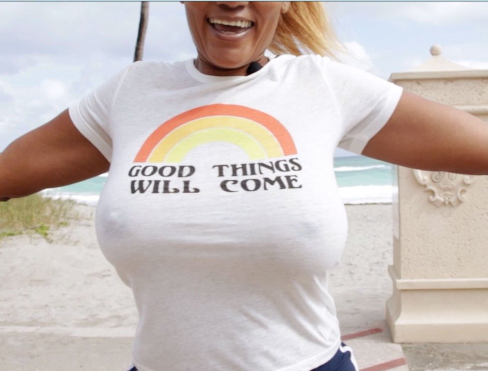 Tits in pink T -shirt