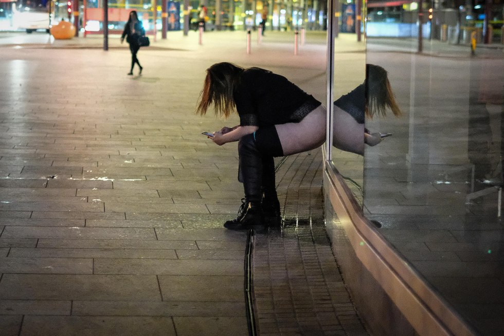 The girl wrote on the street