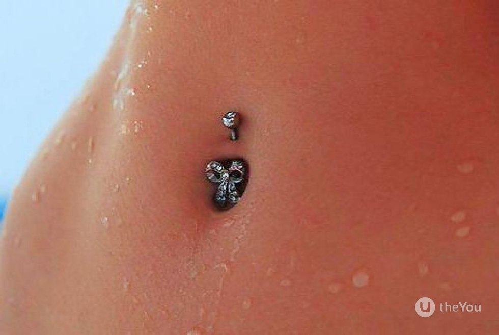 Piercing of the hood of the clitoris