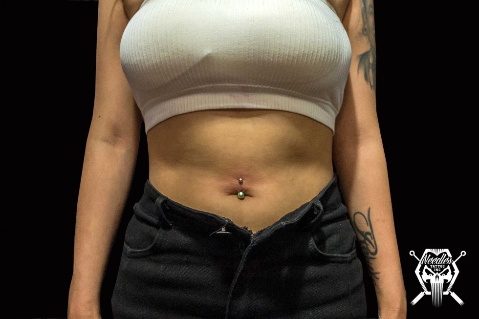 Tunnels piercing women's nipples