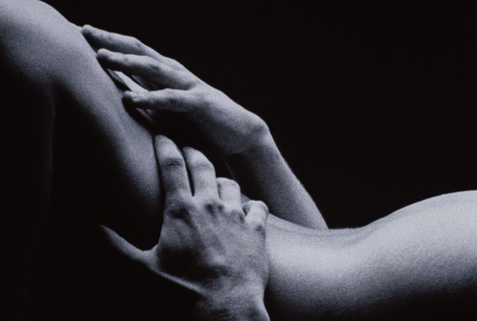 Male hands on the female body