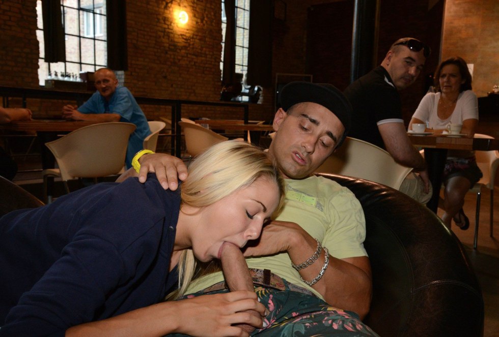 Licks the ass in a public place