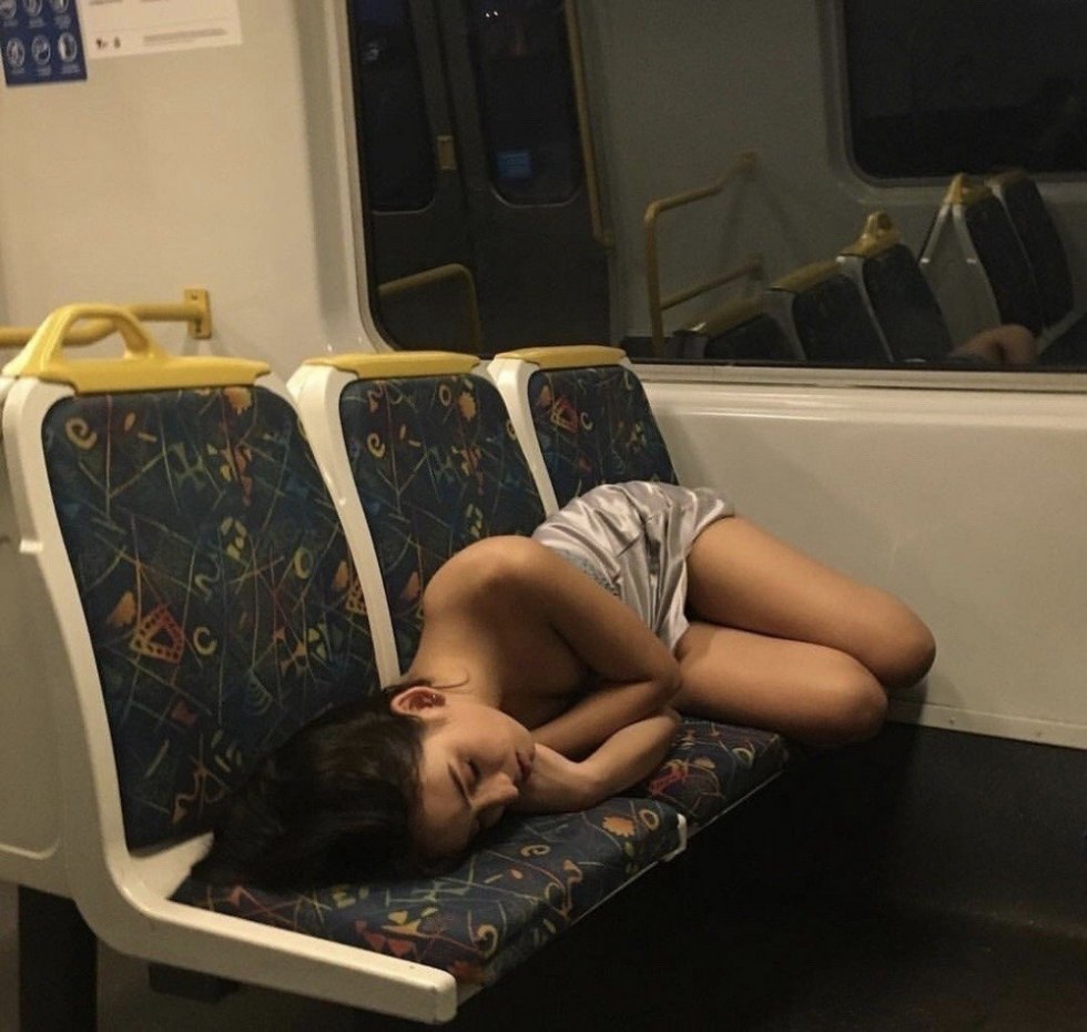 The girl undresses on the train
