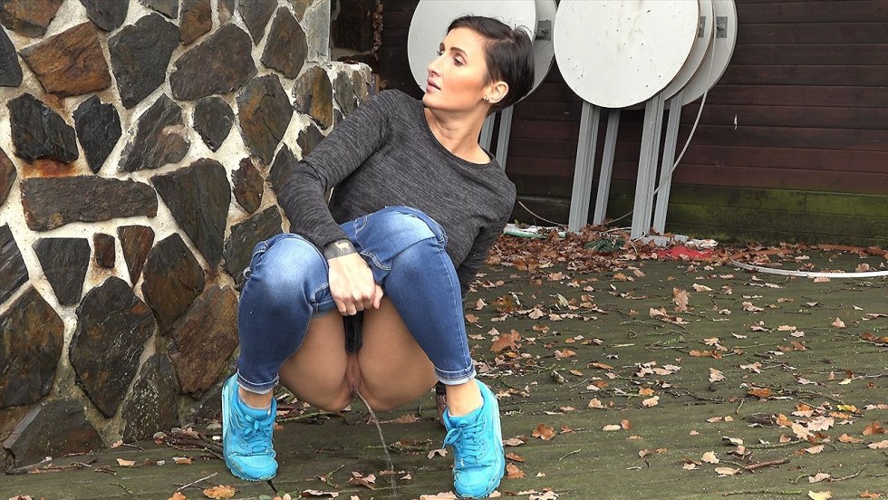 Pissing on the street in a skirt