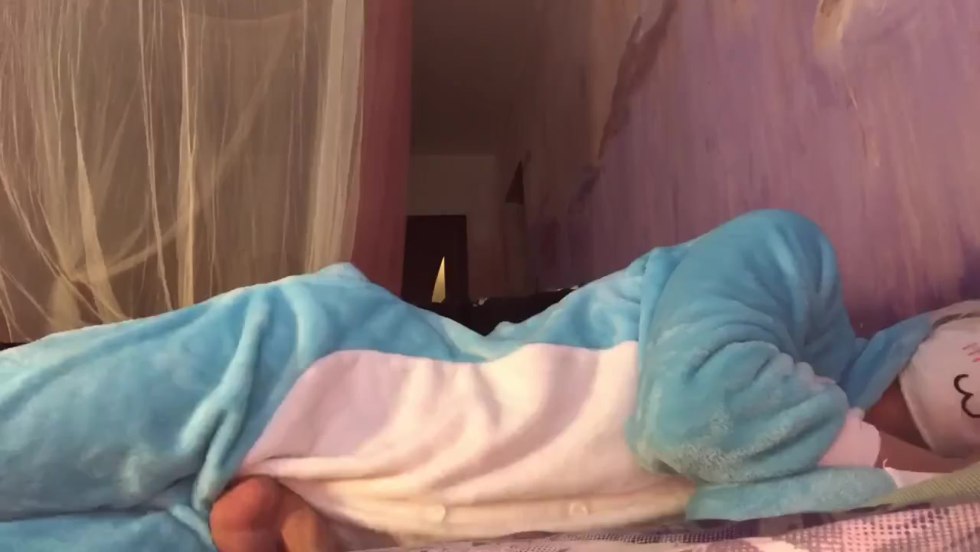 The girl shows boobs in Kigurumi