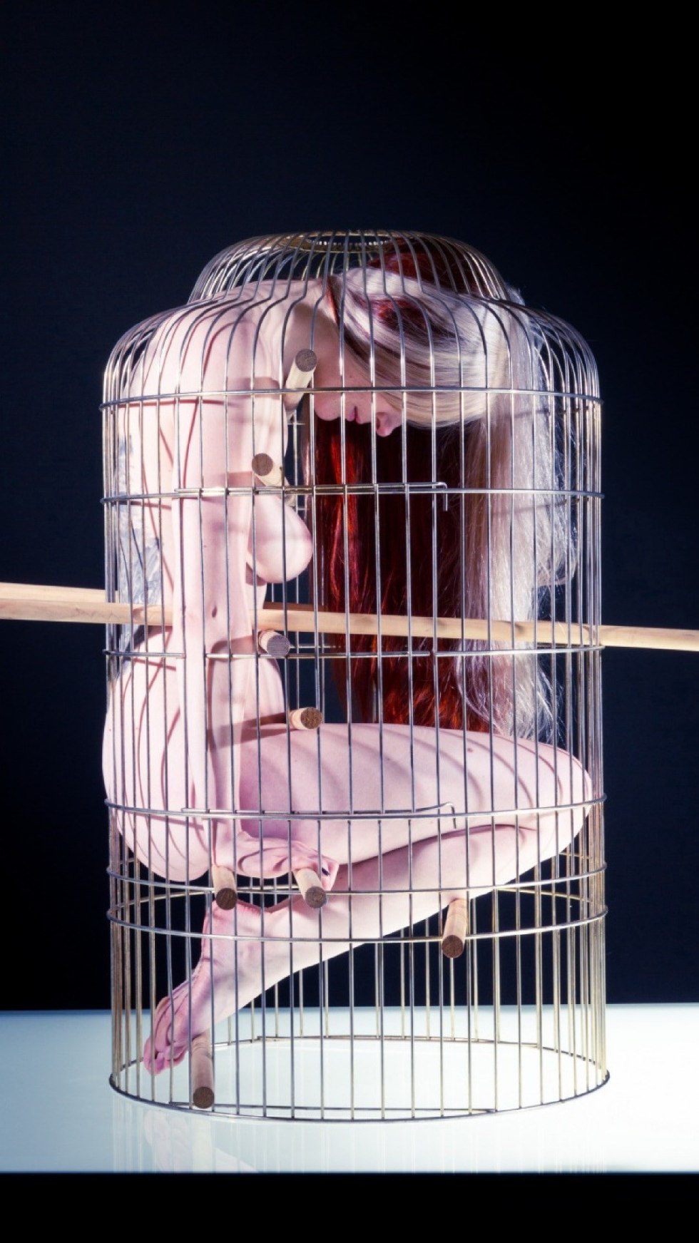 Naked girls in cages