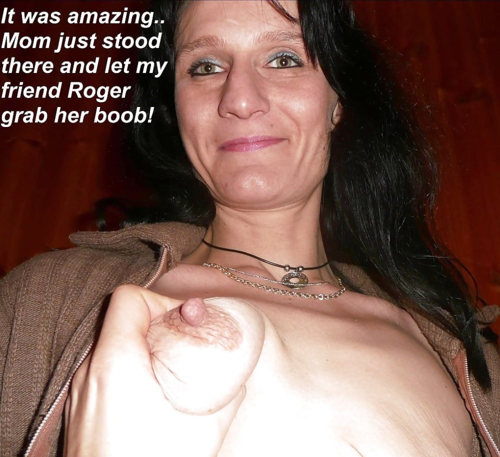 Member between huge boobs