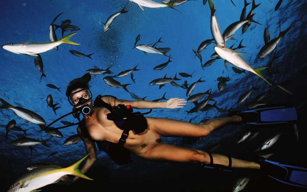 Nude diving into the water is small