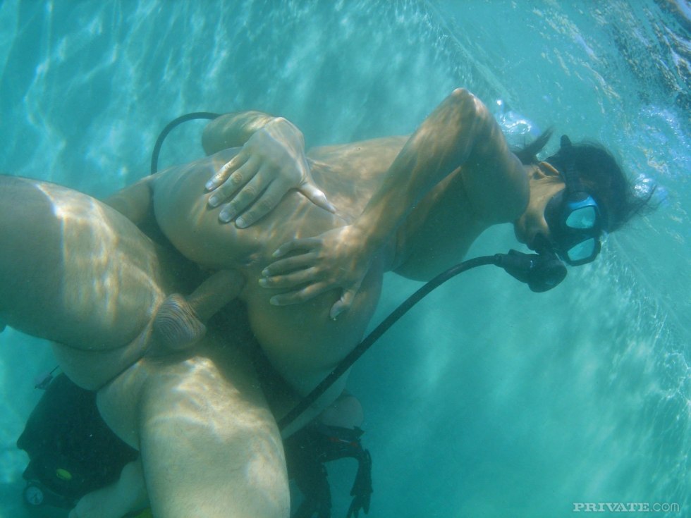 Lesbian swimming in the nude basin