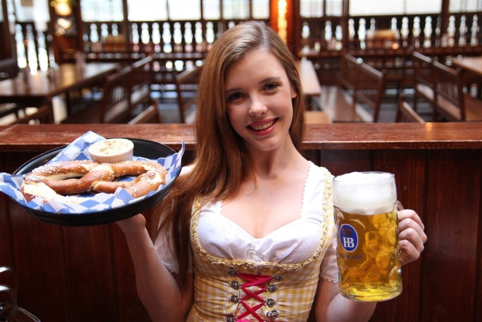 Woman with beer mugs