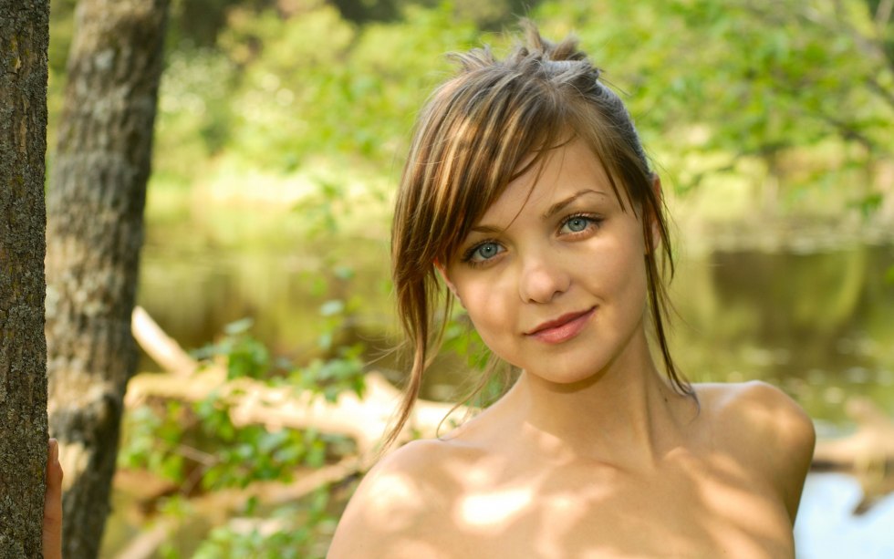 The girl is swimming in a boat