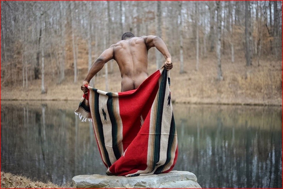 Girl sits by the water