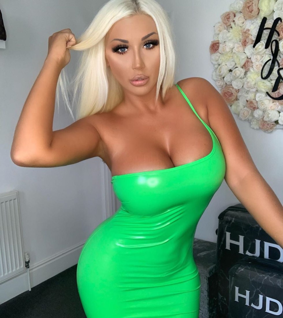 Naked Amelia on the river under a dress without linen