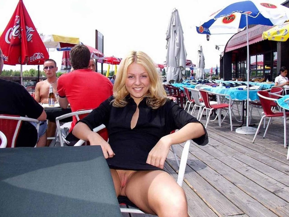 Girl without panties in a cafe