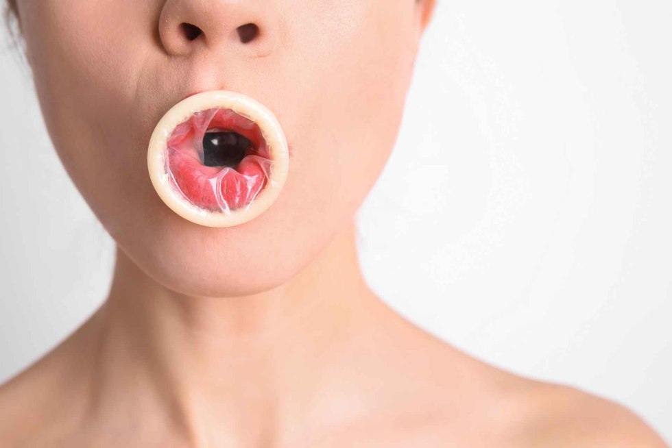 Cums in a condom girl