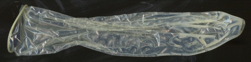 Cum in the mouth in a condom