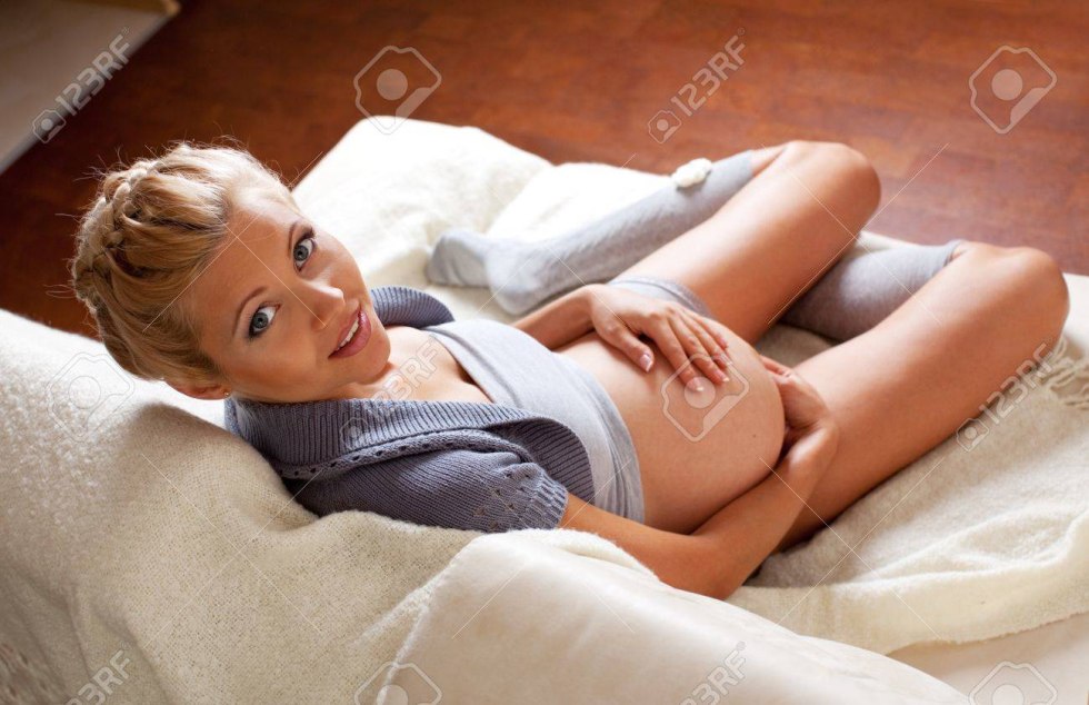 Pregnant women on a dark background