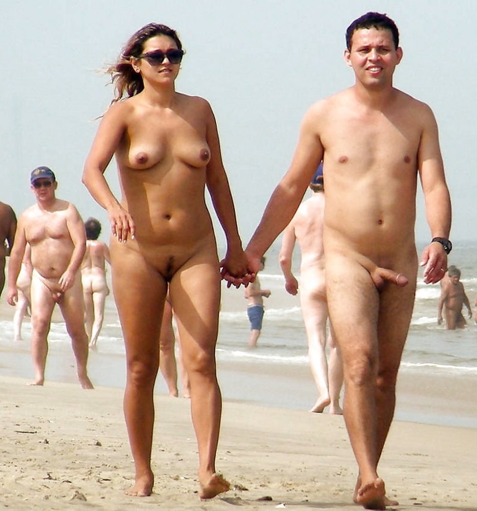 Naked men and women on the beach