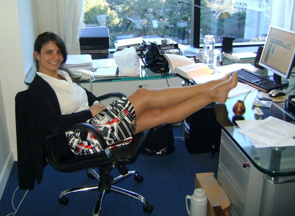 Legs under the table in the office