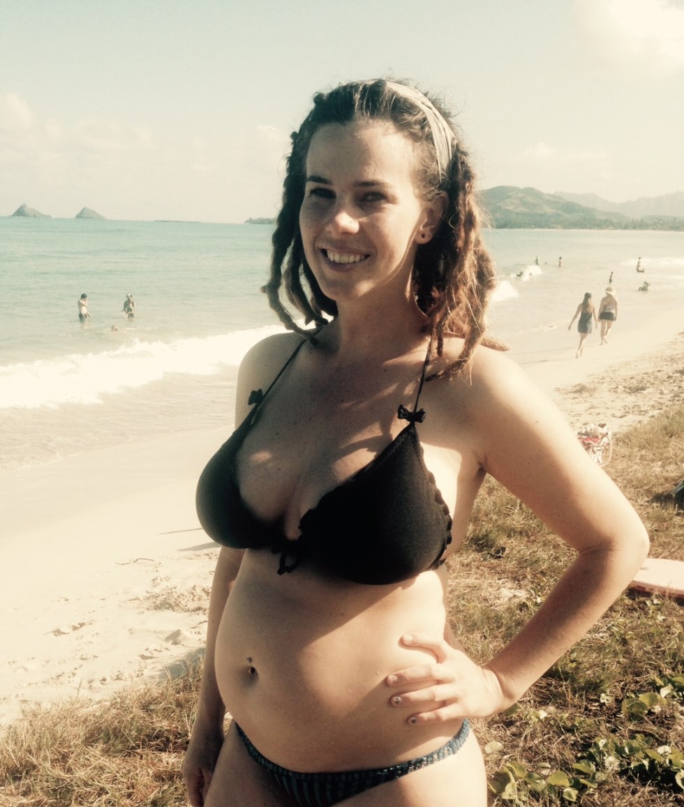 Young pier in a swimsuit