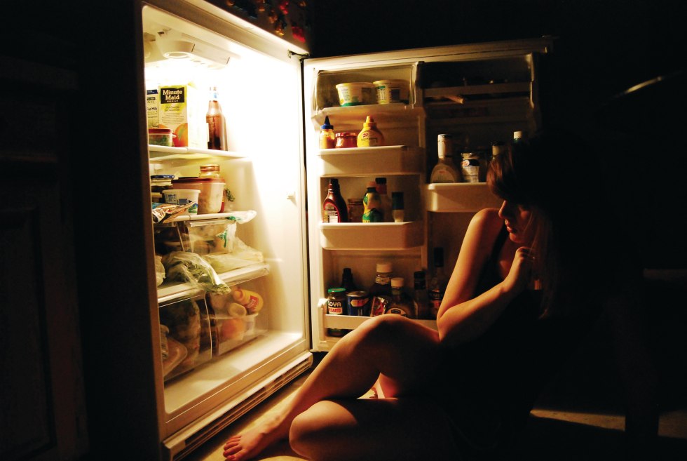 Naked girl in the kitchen