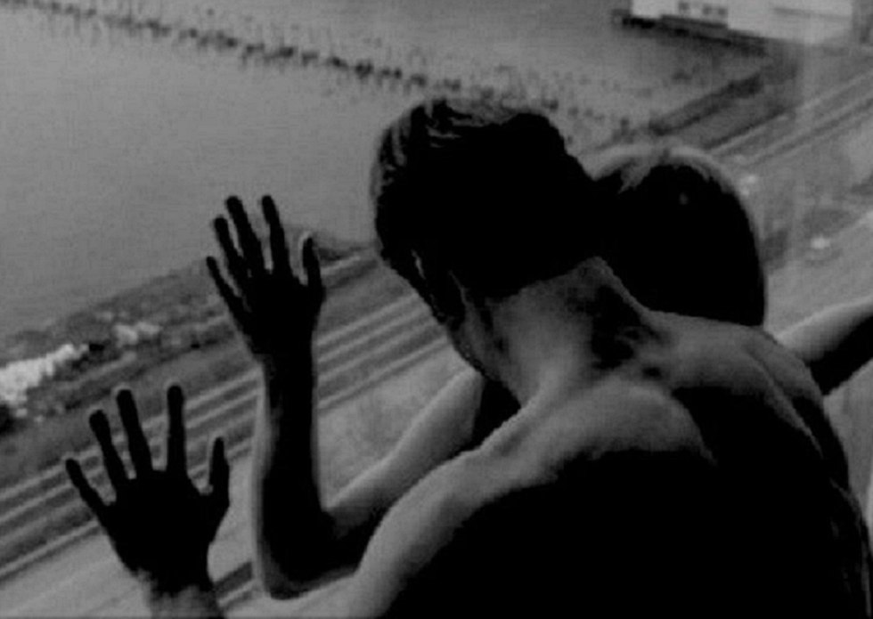 Peeping out the windows behind the naked