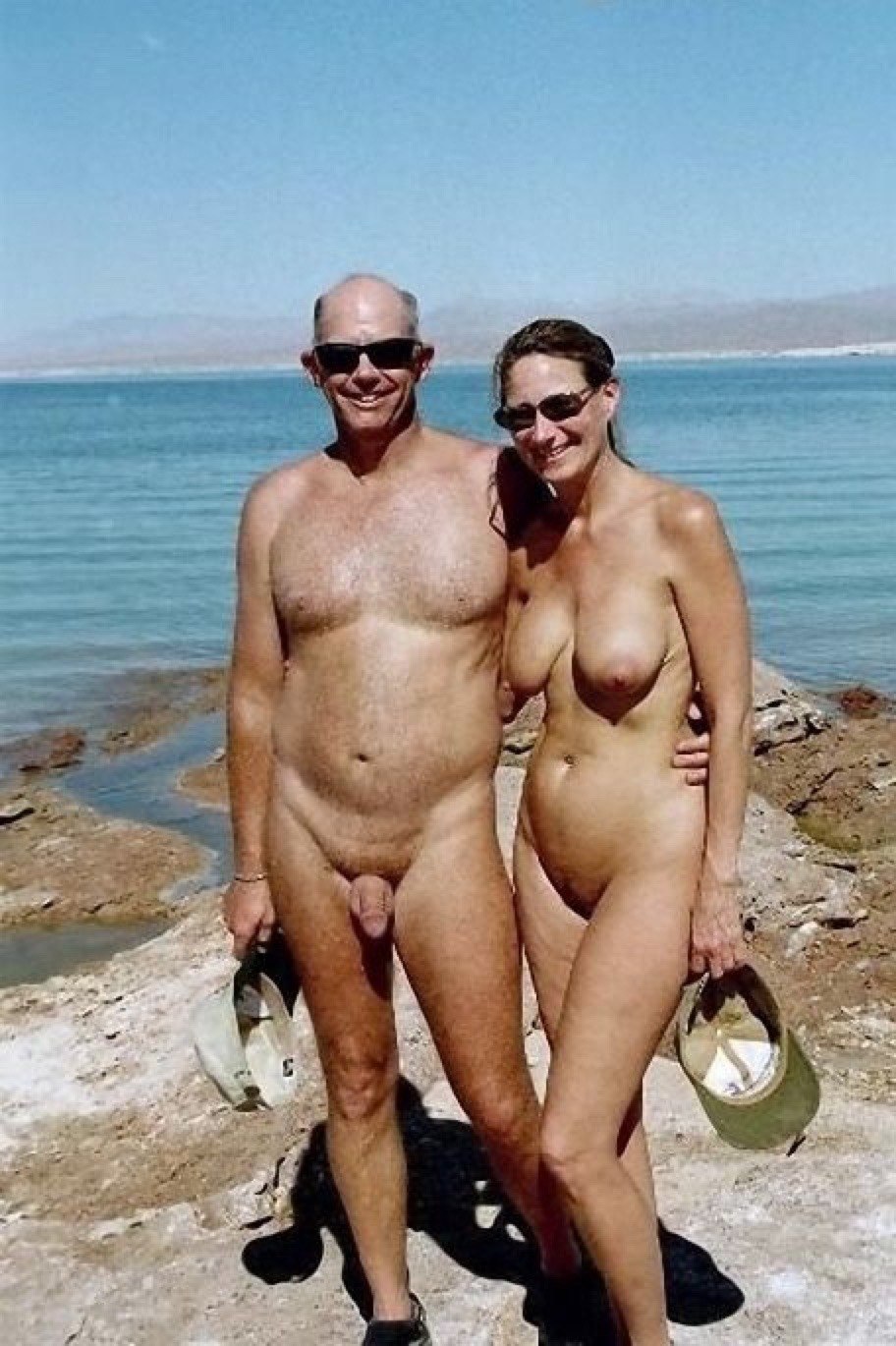 Naked with parents on the beach