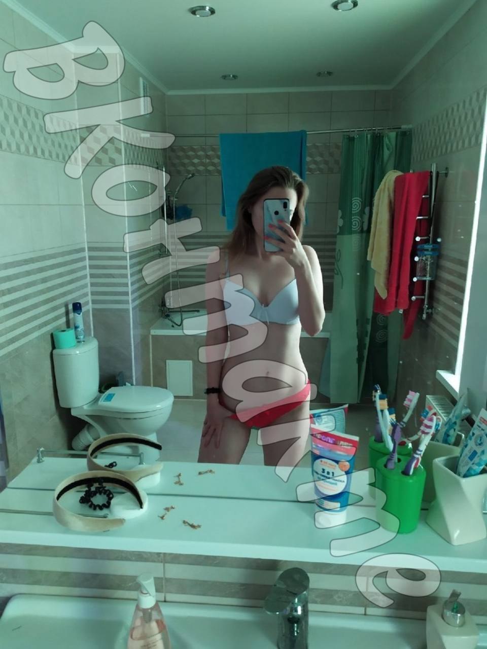 A woman in a boudoir