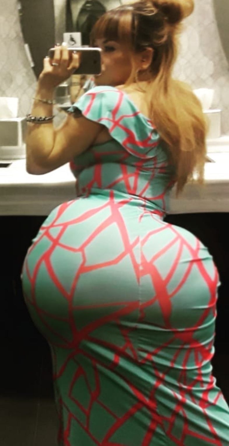 Paige Turnah in a dress