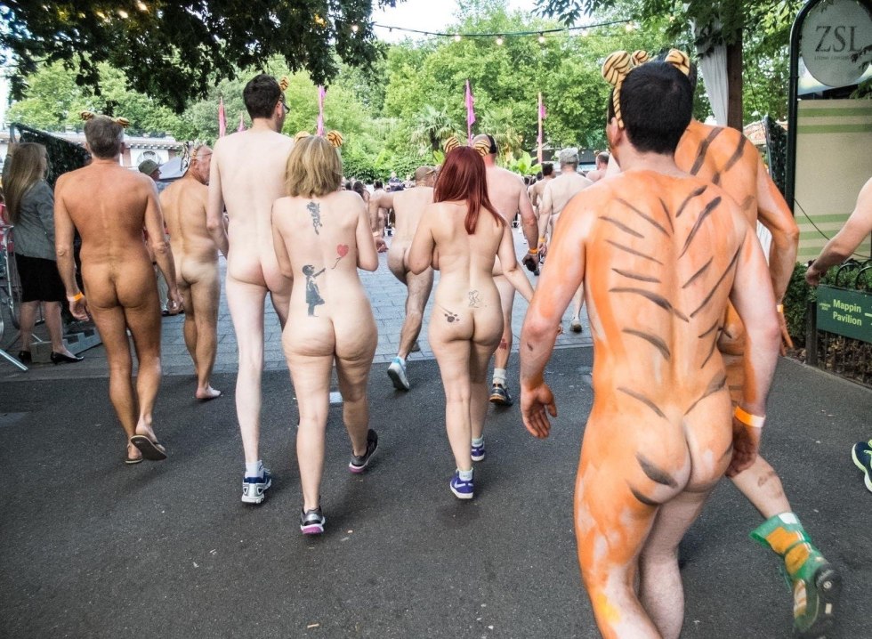 Parade of naked men and women
