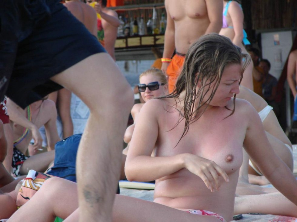 Girls with men Toples on the beach