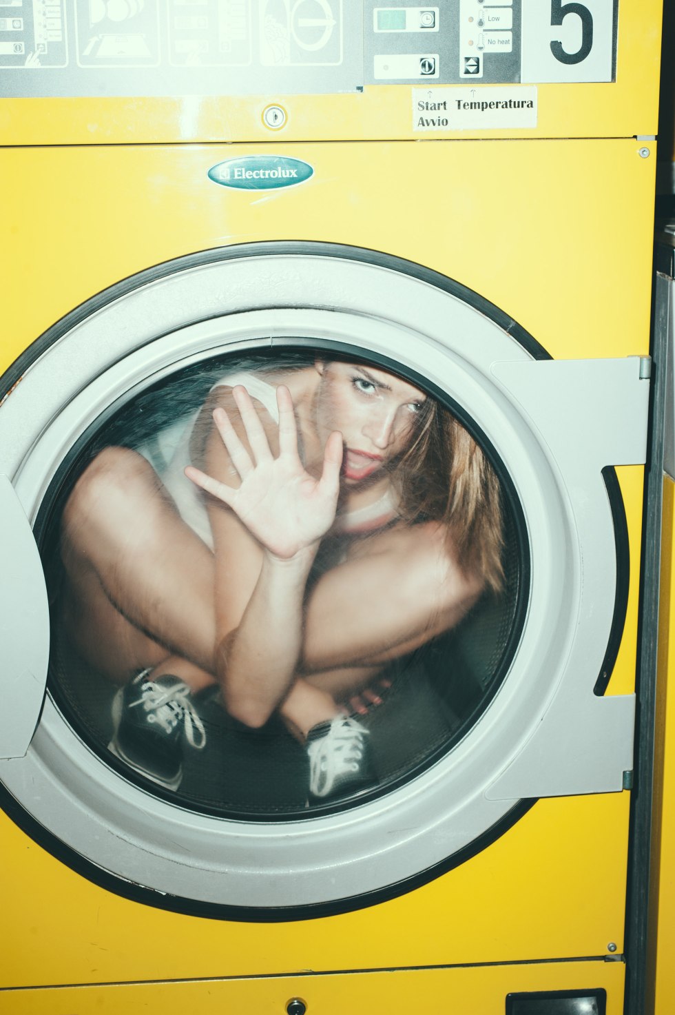 Girl in a washing machine