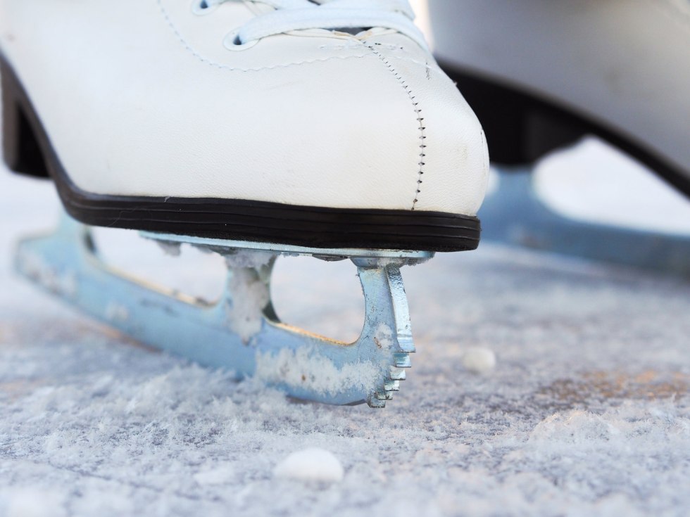 Hockey skates on the rink