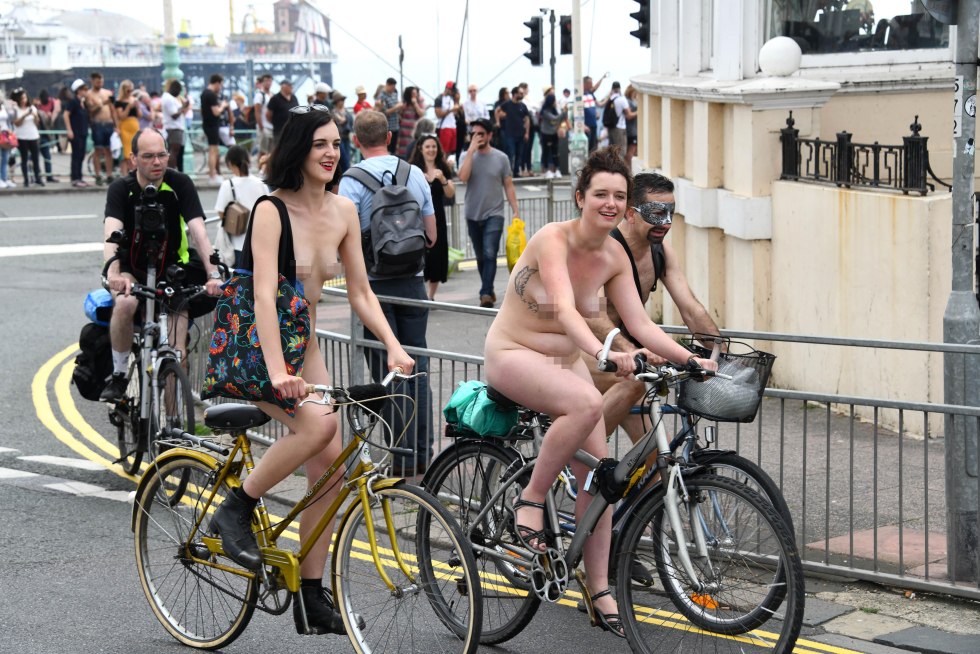 Naked women on a bicycle
