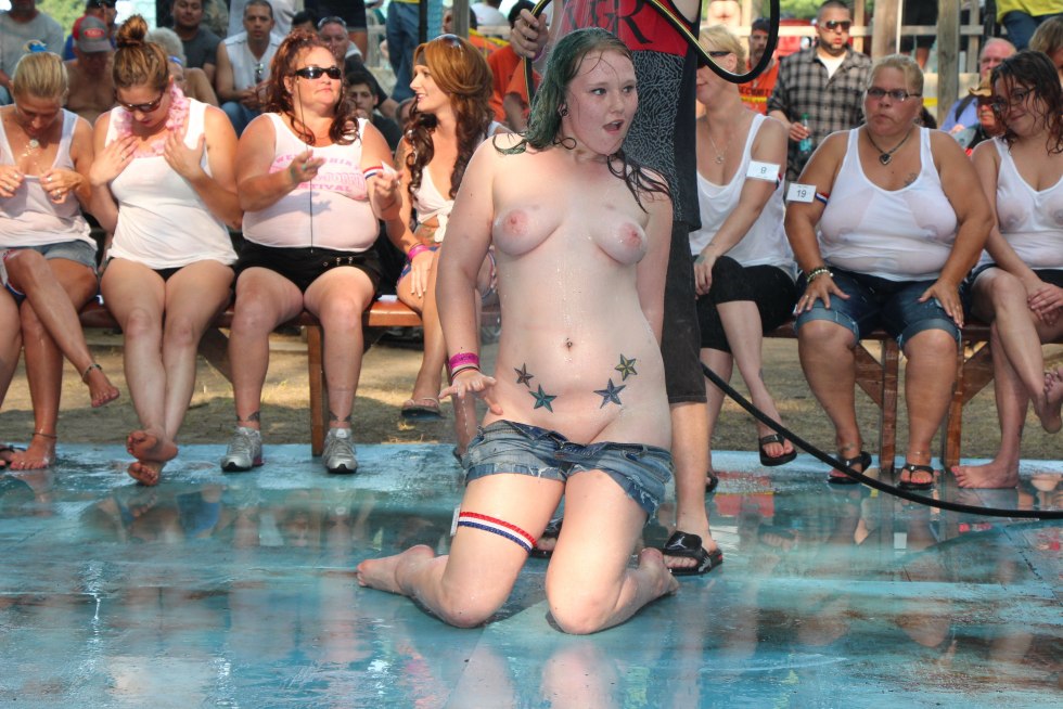 A crowd of girls remove panties