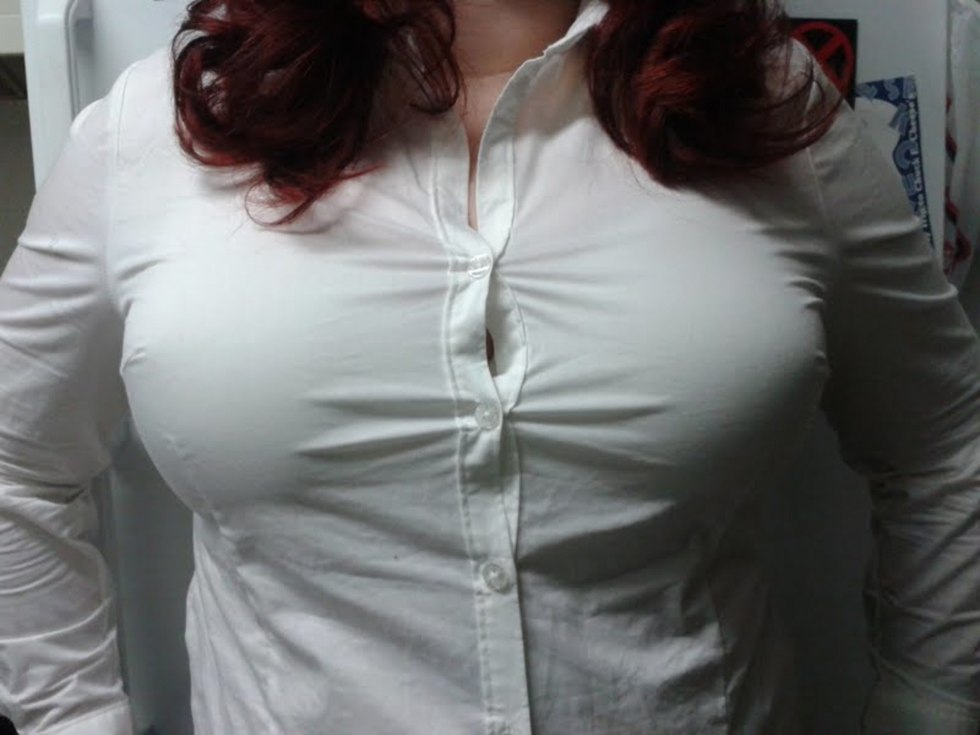 Female breast in a blouse