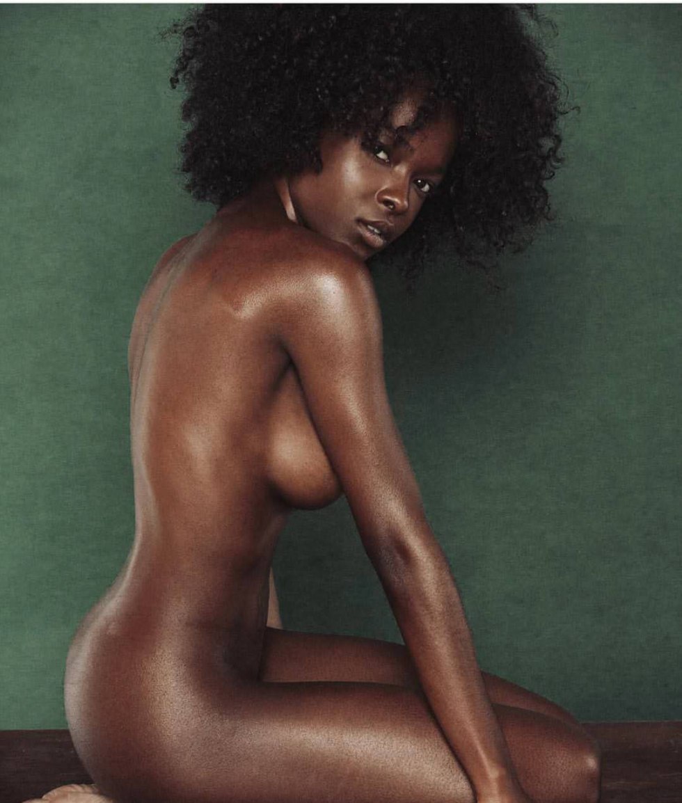 Naked black woman with Afro haircut