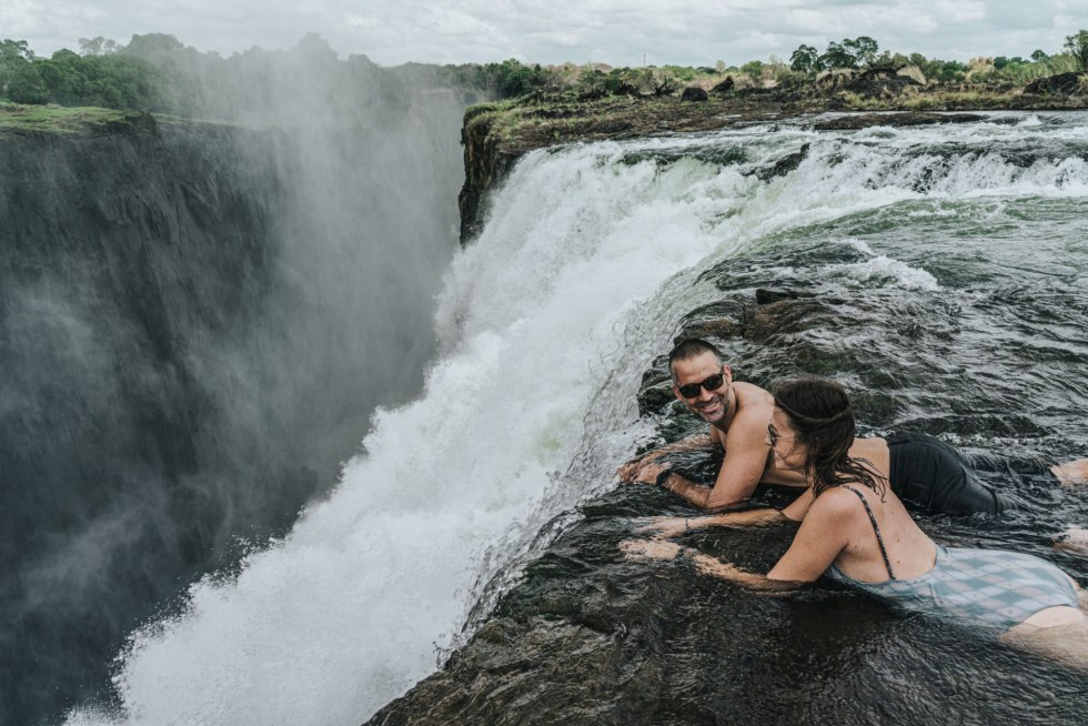 Naked man and woman in the mountains