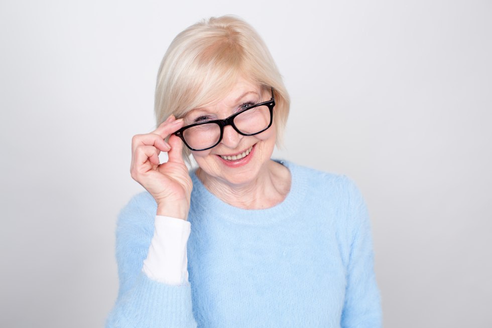 Elderly woman with glasses face