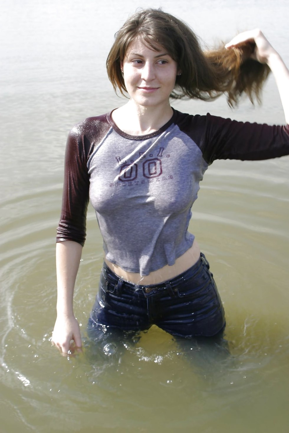 Girl in a T -shirt without a bra