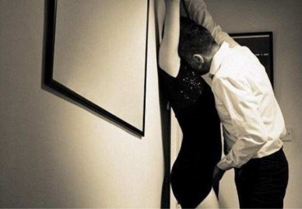 The guy undresses a young girl