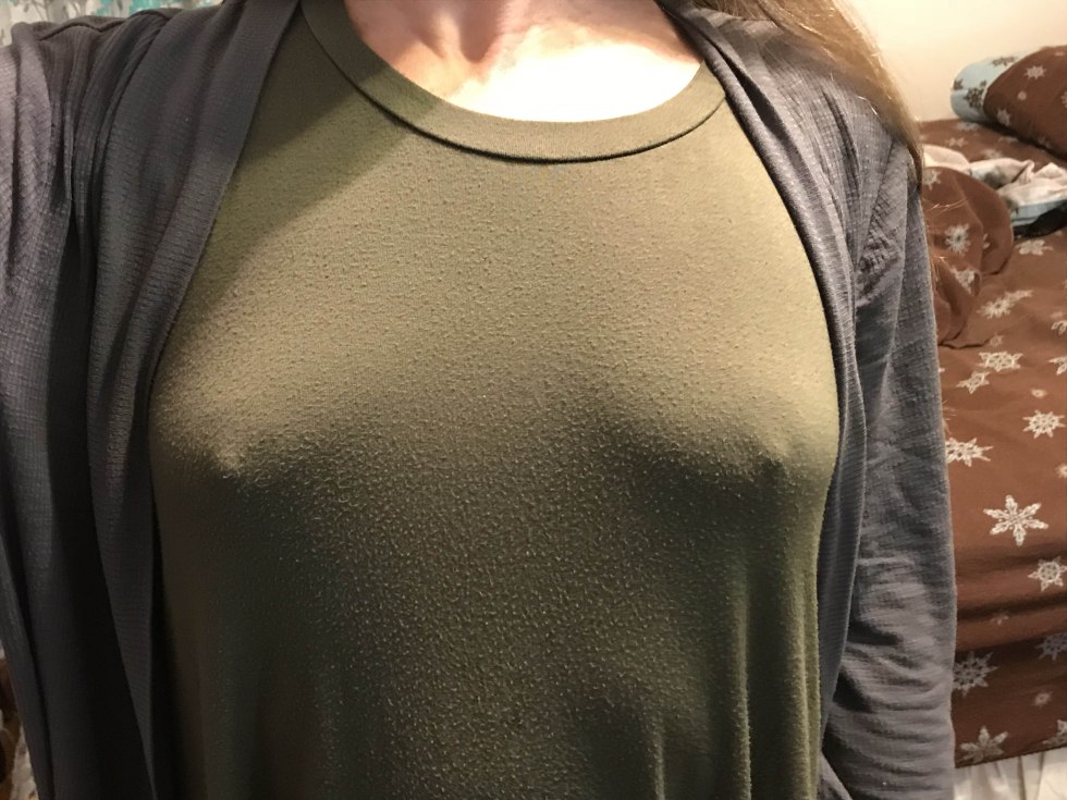 Female breast in a blouse