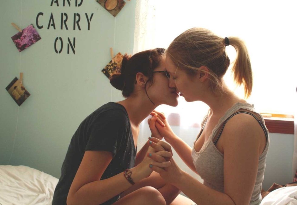 Girls caress each other