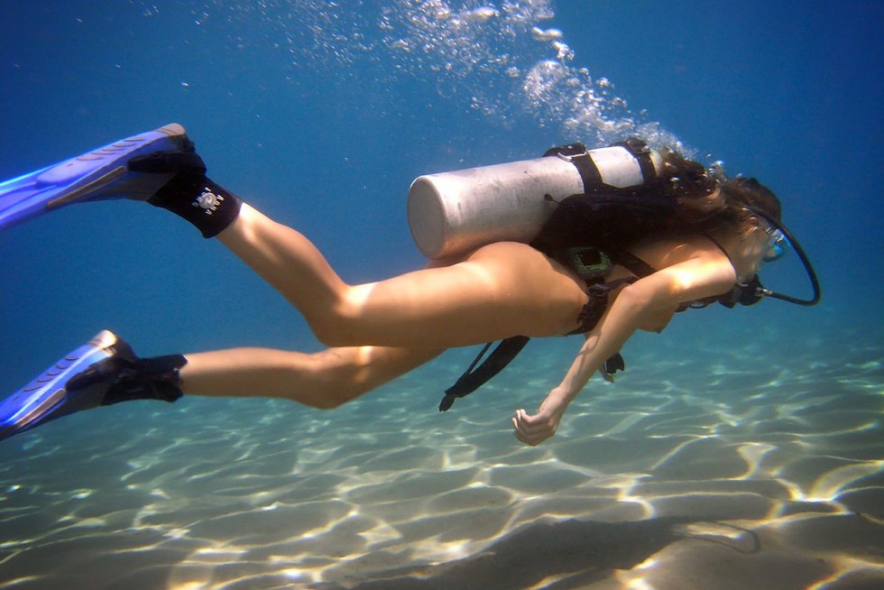 Diving girl without a swimsuit