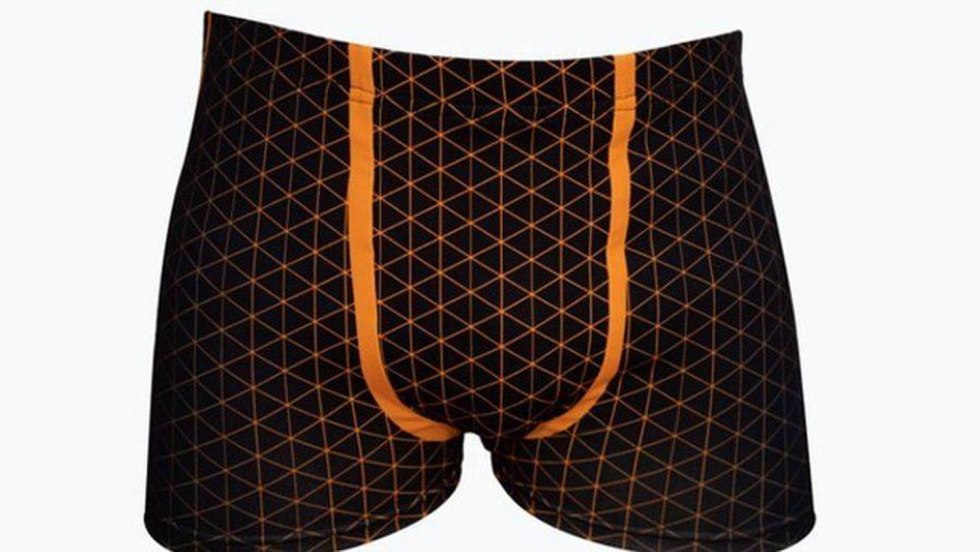 The swimming trunks hide an erection