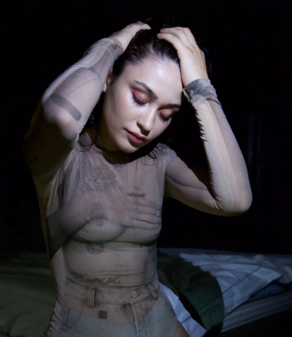 Nudists with legs spread