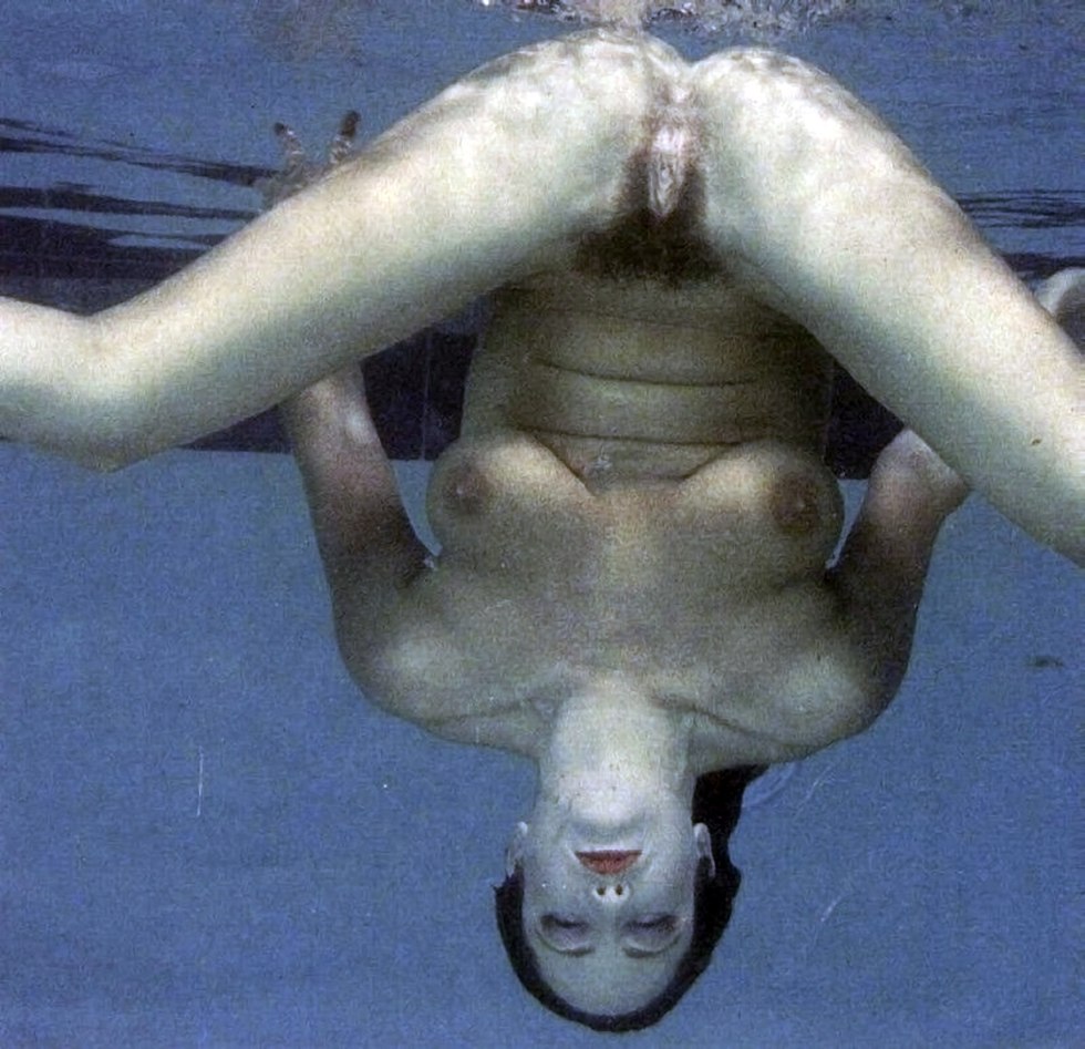 Naked women swim in the pool